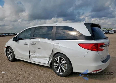 2023 Honda Odyssey Touring from USA, damaged, VIN 5FNRL6H86PB037111